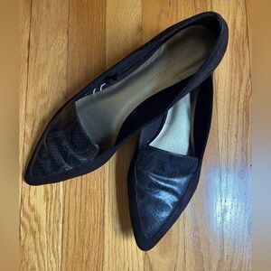 Black pointy-toe loafers